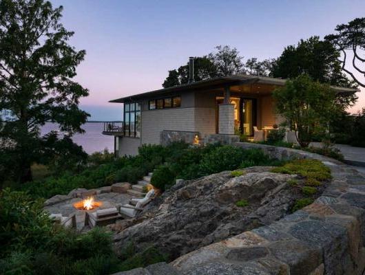 House overlooking the water at dusk